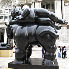 abstract Fernando Botero sculpture fat woman lying on horse